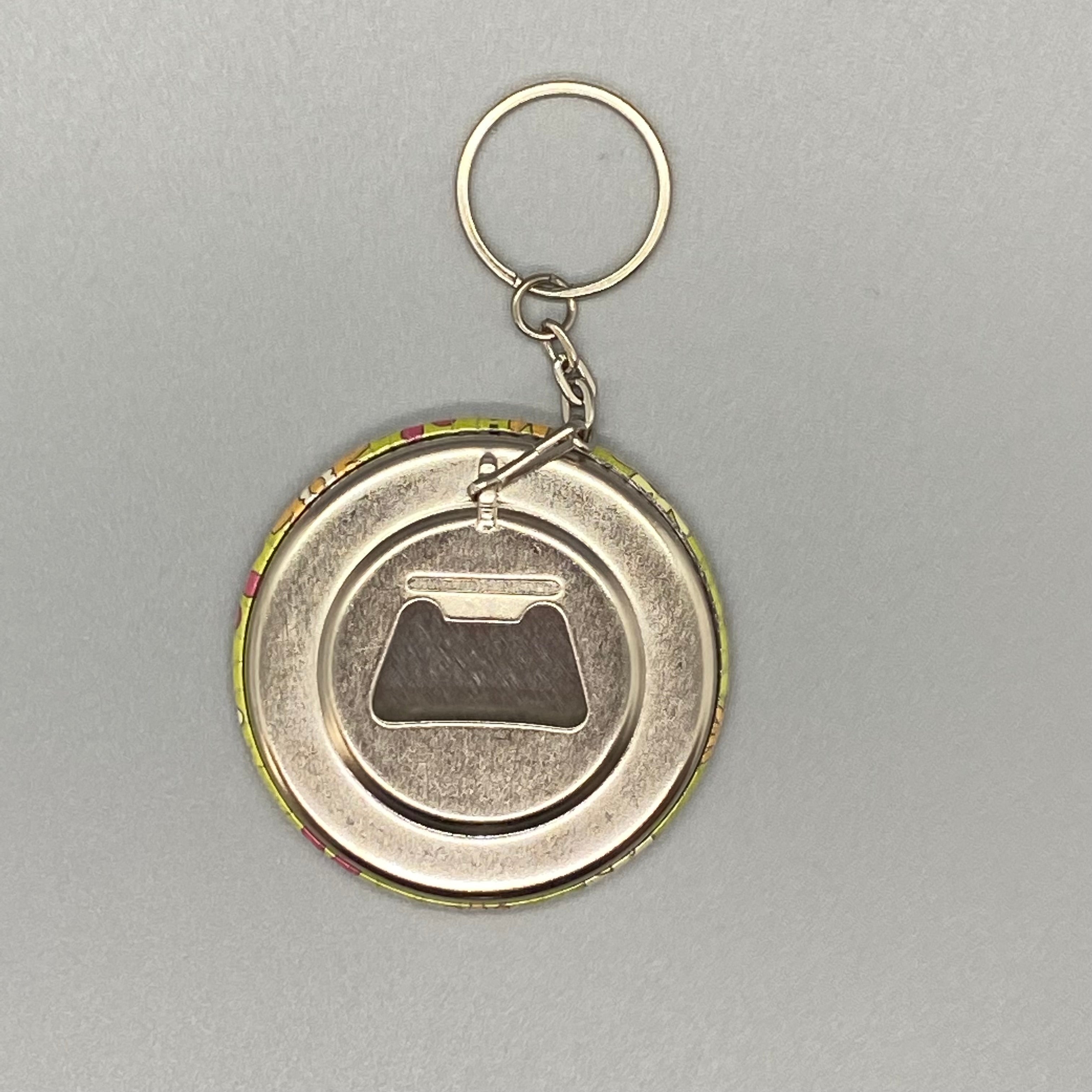 818 KEY CHAIN BOTTLE OPENER - GROOVY